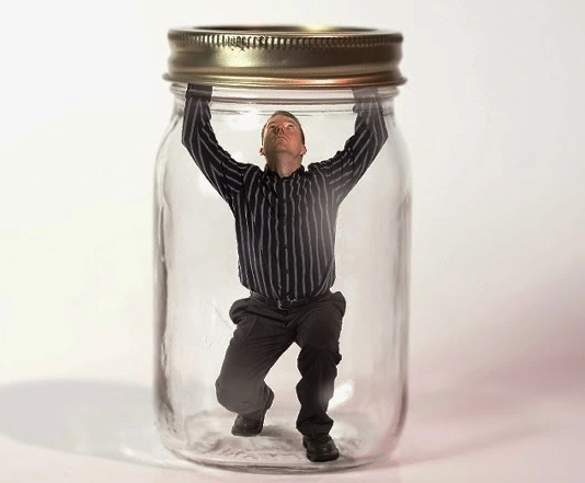 Tag: A man, sealed within a jar.